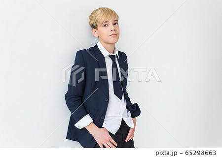 Teenage depression and puberty concept - Sad teenager portrait close up on white background. 65298663