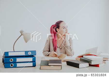 business woman with pink hair Secretary works in an Office paper folders 65301604