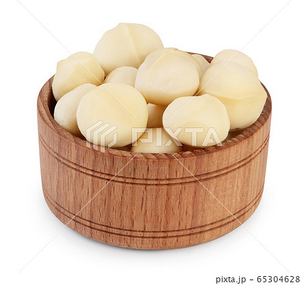 macadamia nuts in wooden bowl isolated on white background with clipping path and full depth of field macadamia nuts in wooden bowl isolated on white background with clipping path and full depth of field 65304628