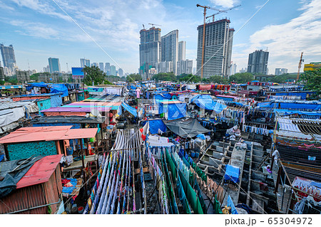 Dhobi Ghat is an open air laundromat lavoir in Mumbai, India with laundry drying on ropes Dhobi Ghat is an open air laundromat lavoir in Mumbai, India with laundry drying on ropes 65304972