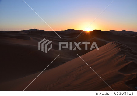 Sand Dunes in the Hot Dessert of Morocco 65308713