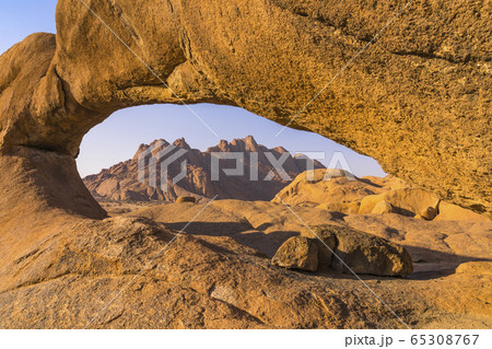 Rock arch in the Spitzkoppe National Park in Namibia. Rock arch in the Spitzkoppe National Park in Namibia. 65308767