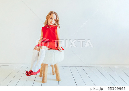 Stay Home Stay Safe. Sweet little girl in red Stay Home Stay Safe. Sweet little girl in red 65309965