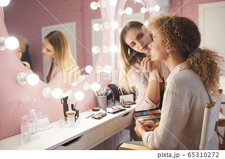 Professional Makeup Artist Working with Client 65310272