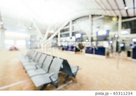 Abstract blur and defocused airport terminal interior Abstract blur and defocused airport terminal interior 65311234