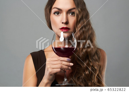 Beautiful middle aged woman with curly hair style Beautiful middle aged woman with curly hair style 65322822