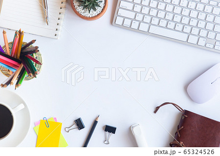 White desk office with laptop, smartphone and 65324526