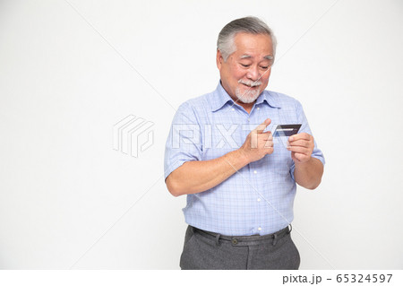 Portrait of senior asian man holding credit card Portrait of senior asian man holding credit card 65324597