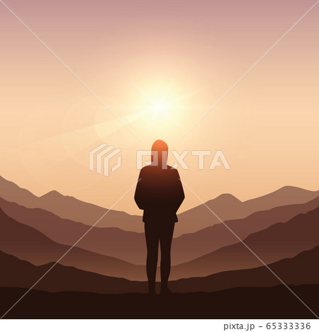 lonely girl on mountain landscape at sunshine 65333336