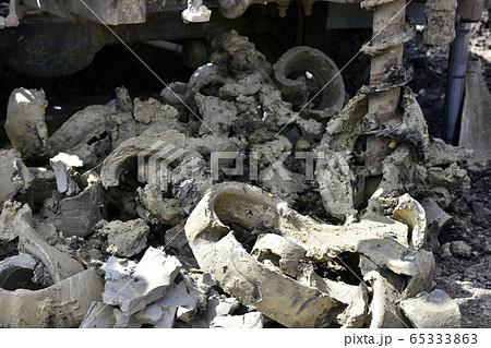 Construction machine for drilling holes in the 65333863