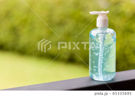 Washing hands with alcohol gel. Sanitizer after using a public restroom. Hygiene concept. Prevent the spread of germs and hand hygiene corona virus protection. Washing hands with alcohol gel. Sanitizer after using a public restroom. Hygiene concept. Prevent the spread of germs and hand hygiene corona virus protection. 65335695