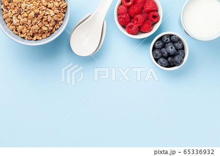 Healthy breakfast with granola and berries Healthy breakfast with granola and berries 65336932