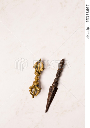 Two vajra on a white background Two vajra on a white background 65338667
