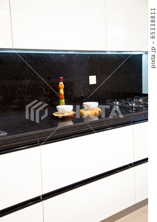 Interior of luxurious modern kitchen white Interior of luxurious modern kitchen white 65338811