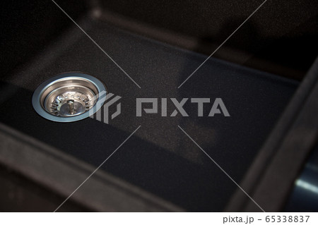 Interior of modern kitchen and acrylic sink drain Interior of modern kitchen and acrylic sink drain 65338837