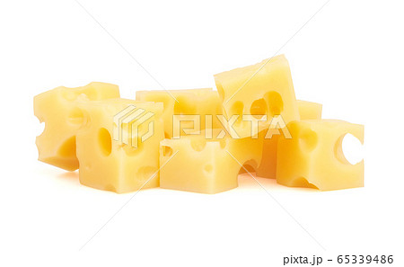 Many pieceses of cheese on white 65339486