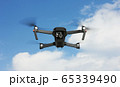 Flying Drone in a sky 65339490