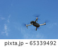 Flying Drone in a sky 65339492