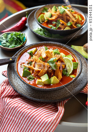 Aztec soup. Close up of mexican tortilla soup Sopa Azteca 65344101