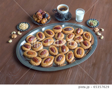 Eid Dates sweets on a wooden table 65357629