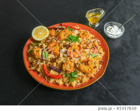 Traditional Indian Biryani with shrimp.  65357630