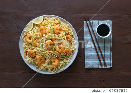 Prawn Schezwan Noodles with vegetables. 65357632
