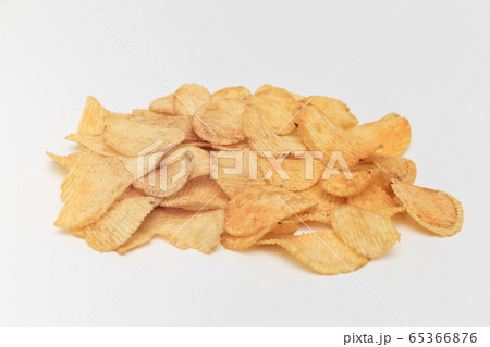 Slice of potato chips on a white background 65366876