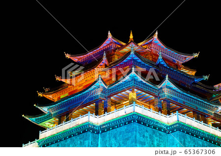 Illuminated Guishan Temple of Tibetan Buddhism at night. Illuminated Guishan Temple of Tibetan Buddhism at night. 65367306