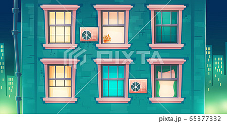 Building facade with windows at night Building facade with windows at night 65377332