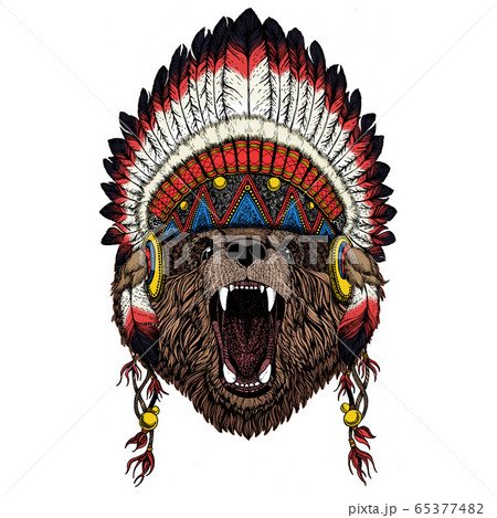 Wild bear. Portrait of animal for emblem, logo, tee shirt. Indian traditional headdress. 65377482