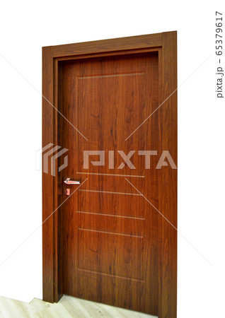 Modern brown front wooden door in house interior 65379617
