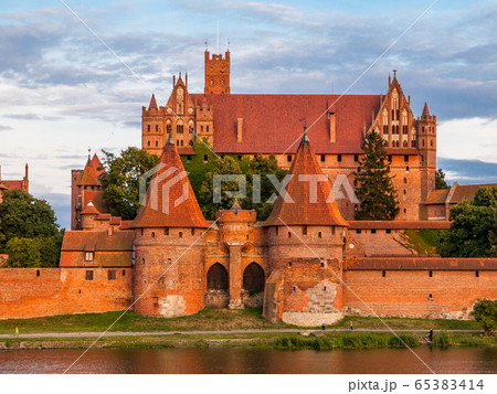 Fortification walls and guard towers of Teutonic Castle in Malbork, Poland 65383414