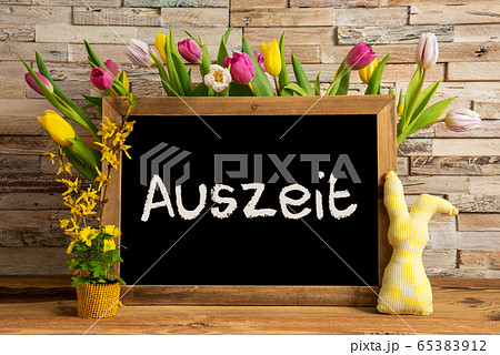 Tulip Flowers, Bunny, Brick Wall, Blackboard, Text Tulip Flowers, Bunny, Brick Wall, Blackboard, Text 65383912