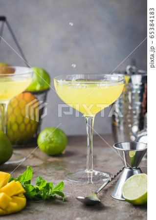 Margarita Mango Alcoholic cocktail. 65384183