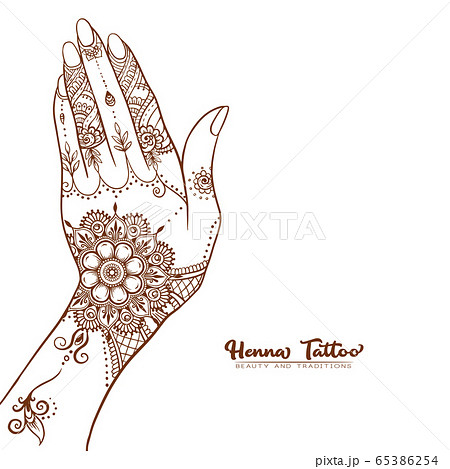 Hands with traditional indian henna tattoo. 65386254