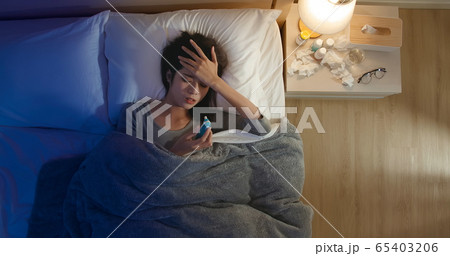 woman sick and has fever woman sick and has fever 65403206