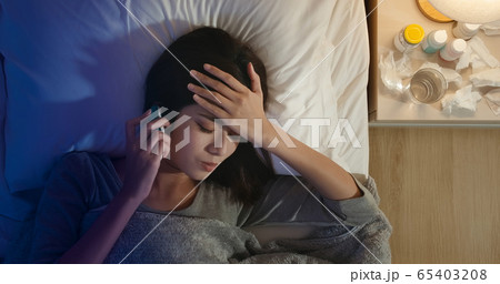 woman sick and has fever woman sick and has fever 65403208