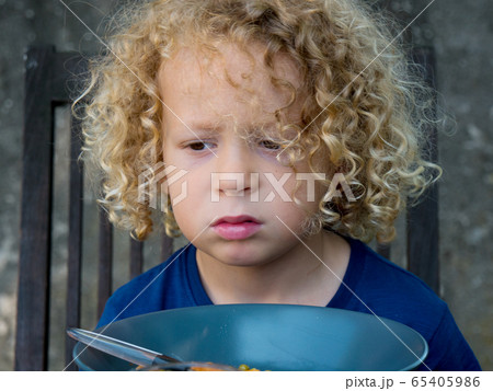 boy refusing to eat boy refusing to eat 65405986