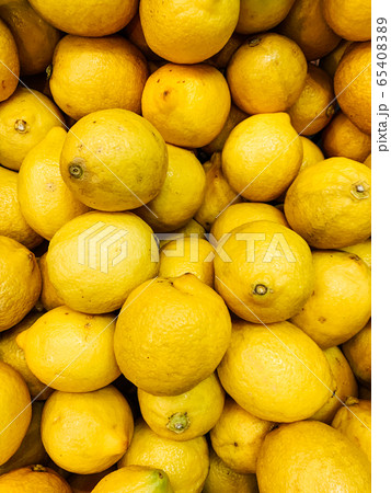 lots of ripe citrus yellow lemons for eating like a background lots of ripe citrus yellow lemons for eating like a background 65408389