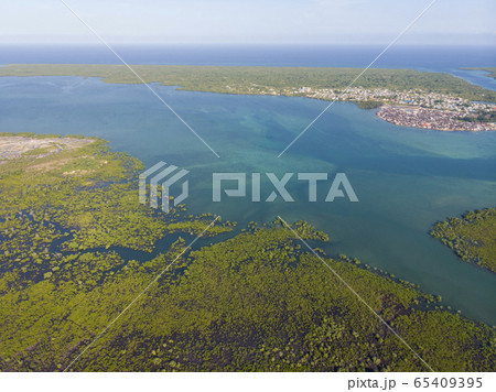 Uninhabited Tropical Islands in Indian Ocean. Aerial view of Pemba Island, Zanzibar. Tanzania. Africa 65409395