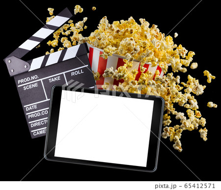 Flying popcorn, film clapper board and phone isolated on black background Flying popcorn, film clapper board and phone isolated on black background 65412571