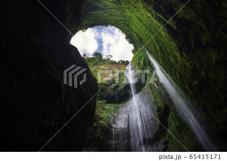 Madakaripura Waterfall is the tallest waterfall in deep Forest in East Java, Indonesia Madakaripura Waterfall is the tallest waterfall in deep Forest in East Java, Indonesia 65415171