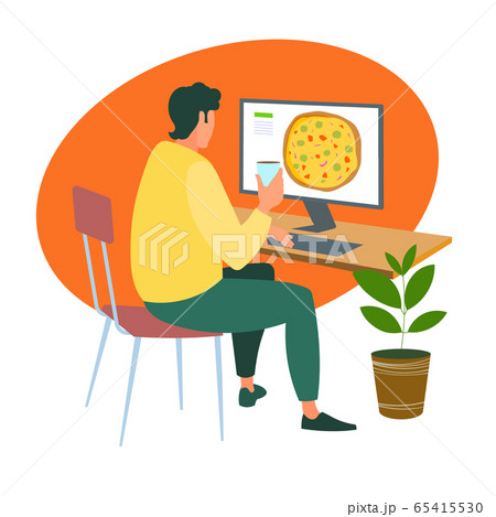 A man orders a pizza online from a computer during the quarantine 65415530