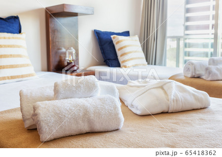 Modern bedroom with large glass windows. European hotel design. Close-up. Modern bedroom with large glass windows. European hotel design. Close-up. 65418362