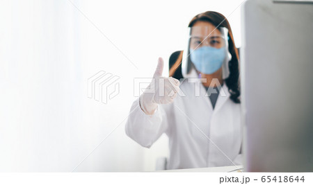 Doctor preparing for the surgical operation and Doctor preparing for the surgical operation and 65418644