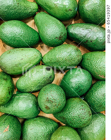 lots of ripe green avocados for eating a background lots of ripe green avocados for eating a background 65419397