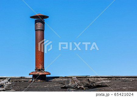 Old rusty chimney. 65421024