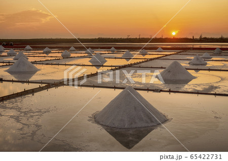 Salt pan with sunset in Tainan, Taiwan Salt pan with sunset in Tainan, Taiwan 65422731