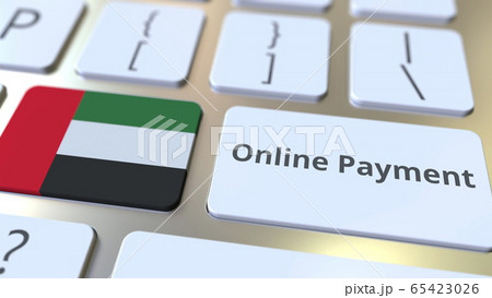 Online Payment text and flag of the United Arab Emirates UAE on the keyboard. Modern finance related conceptual 3D rendering 65423026
