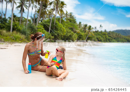 Mother and child on tropical beach Mother and child on tropical beach 65426445